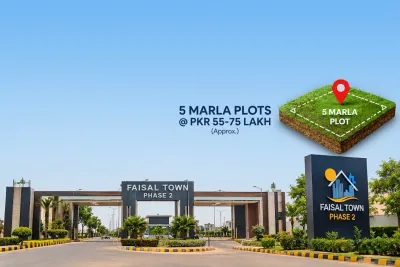 Faisal Town Phase 2 main entrance gate with 5 Marla plots price range PKR 55-75 Lakh