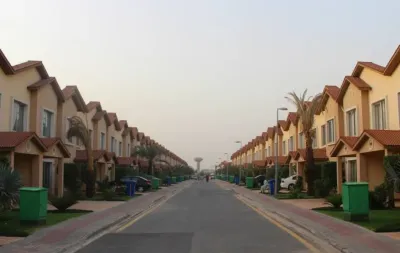 An overview of Quaid Block, Bahria Town Lahore, showcasing its residential surroundings, housing options, nearby facilities and community environment.