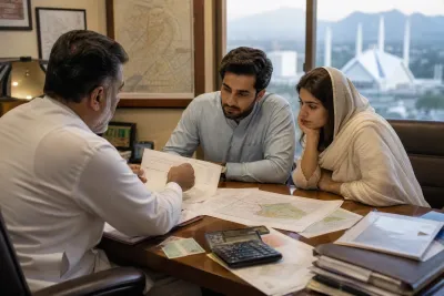 Islamabad property dealer office 2026 — buyer couple reviewing plot documents and sector maps with an agent