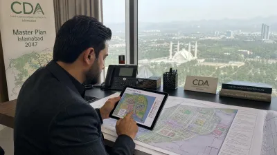 Real estate investor verifying CDA layout plans and property maps on a digital tablet in a professional office setting.