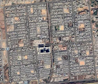 "Satellite map view of G-13 sector Islamabad showing G-13/1 and G-13/4 sub-sectors, street grid layout, and Golra Road"