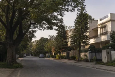 Quiet, established residential street with mature trees in Islamabad's G-9 sector.