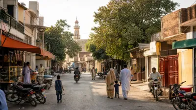 Residential streets and housing developments representing a comparison between Gulshan Abad and Media Town Rawalpindi, focusing on family housing, property sizes and mid-market demand.