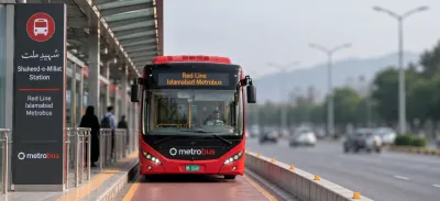 Red Line Metrobus at Shaheed-e-Millat station on Jinnah Avenue, about 2 km from F-5 Islamabad